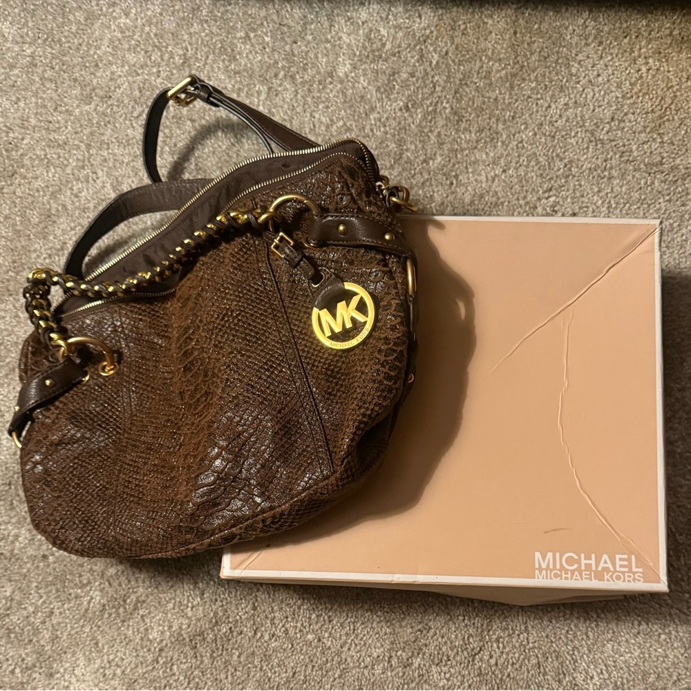 Michael Kors shoulder bag
Brown Leather animal print